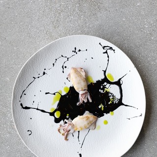 2. pan seared squid with sepia ink spicy sauce and extra virgin olive oil