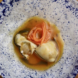 2. pickled oyster escabeche with carrot  tangerine and oil from roasted sunflower seeds. option 2